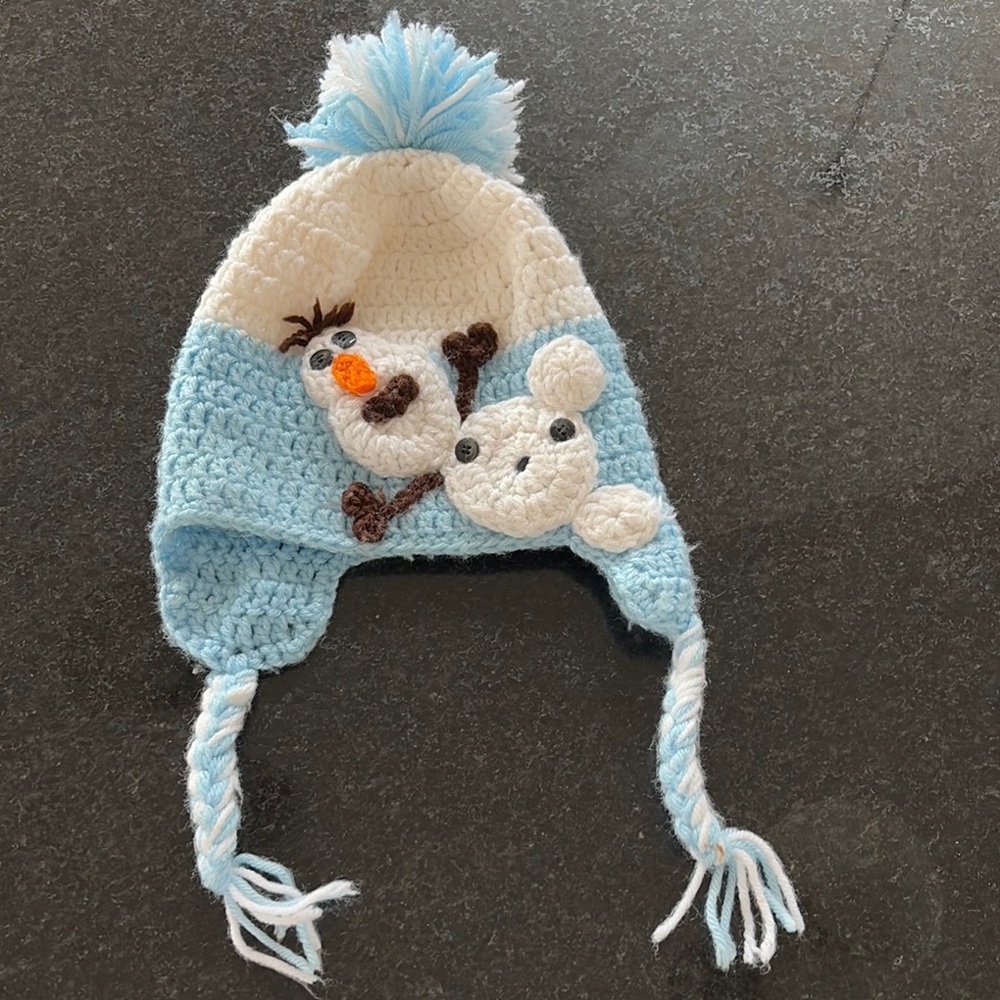 Handmade Blue and White Crochet Hat with Snowman Design